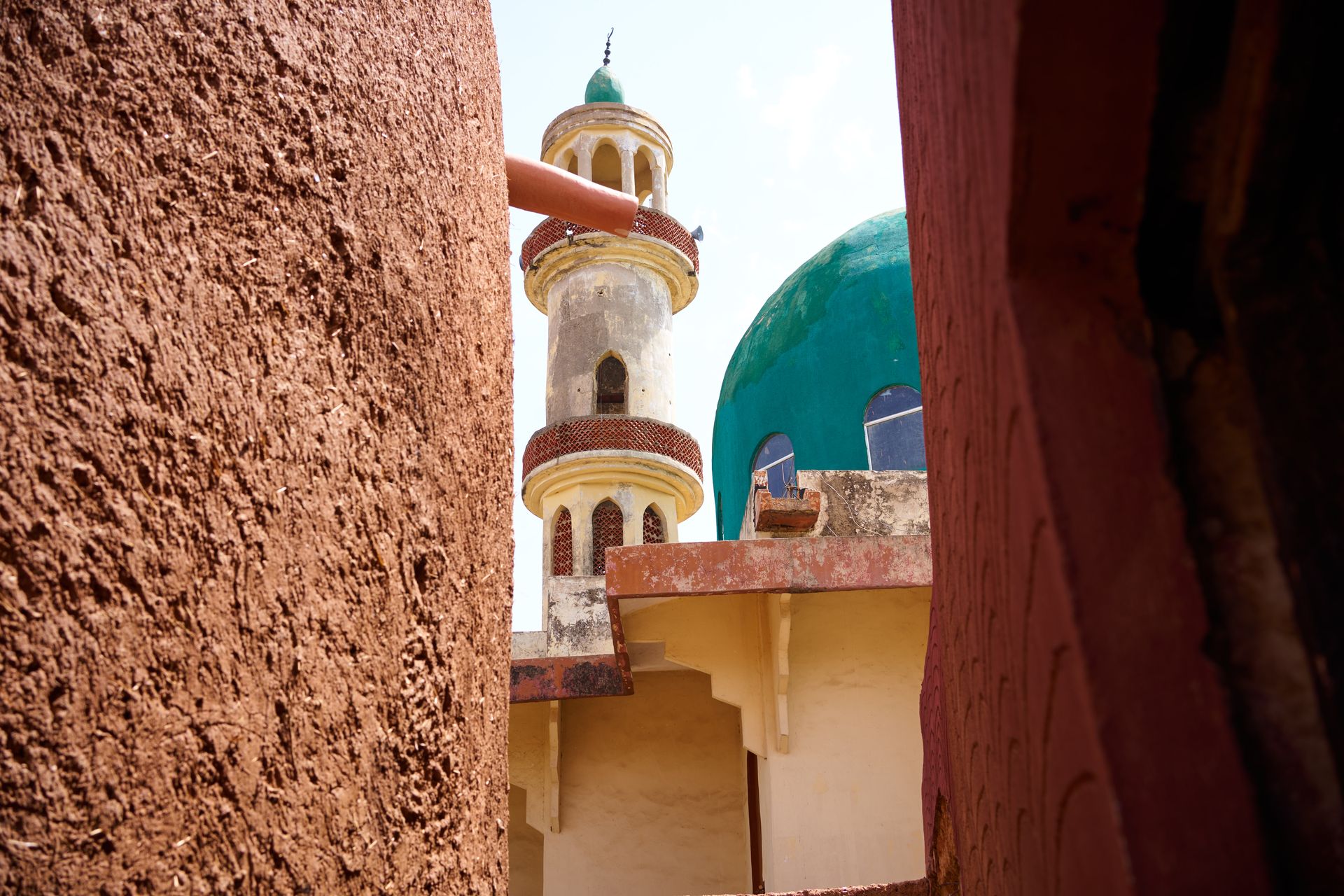 Detail of the colourful architectural patterning on a mosque in Kano, Nigeria